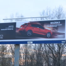 Winyl Frontlite na tablicach 12x3m. Stroeer. Projekt zrealizowany dla Mazda Polska, Dom Mediowy MEC